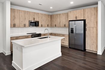 European style cabinetry & quartz countertops